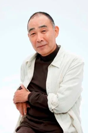 Portrait photograph of Japanese actor Denden