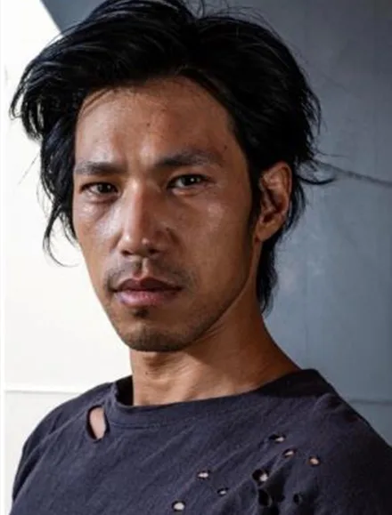 Portrait photograph of South Korean actor Kim Min