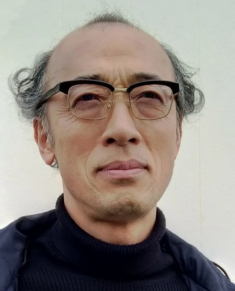 Yoshi Sakou portrait profile photograph from 1958