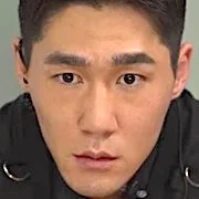 Actor Lee Yoon-Hwan portraying Yoon Han-Gu.