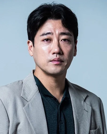 Portrait photograph of actor Yoon Kwan-Woo