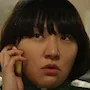 Kim Hyun-Sook portraying Min-Jung