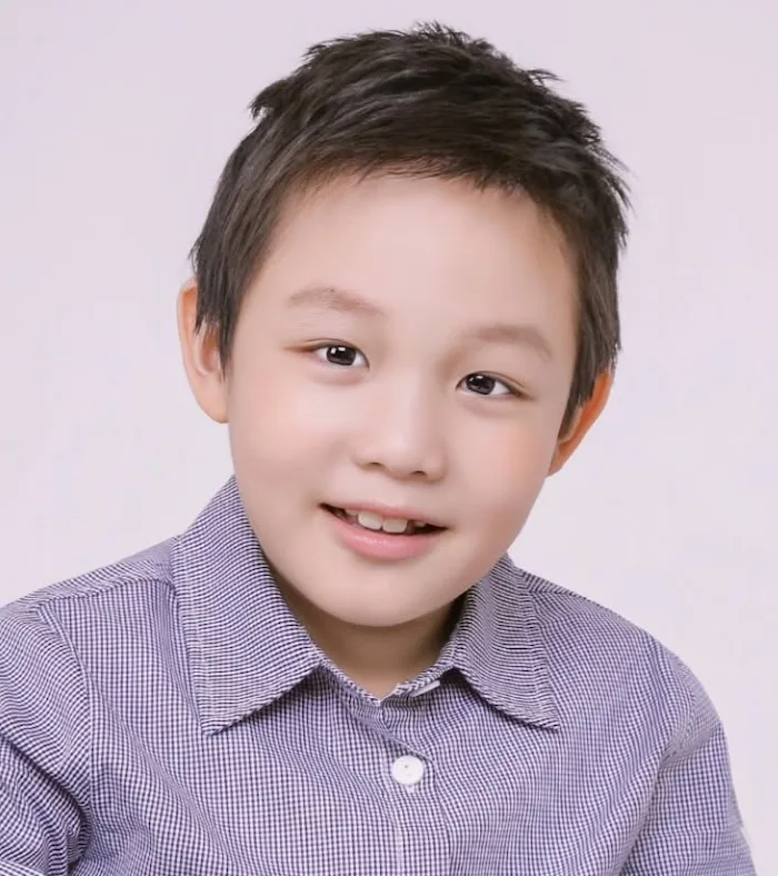 Portrait photograph of child actor Kim Si-Jun