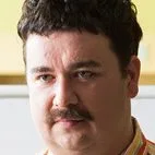 Sam Hammington as English Teacher