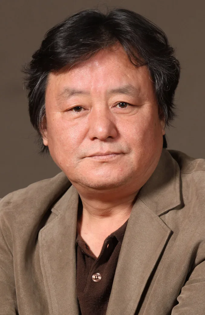 Portrait photograph of South Korean actor Kim Jong-Goo.