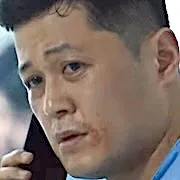 Actor Jung Myung-Kun portraying an enforcer.