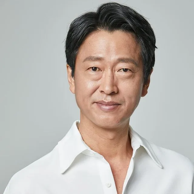 Portrait photograph of South Korean actor Park Wan-Kyu