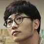 Jin Goo as pottery store owner