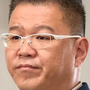 Shinobu Hasegawa portraying Masumi Okawa