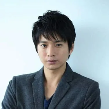 Portrait photograph of Osamu Mukai