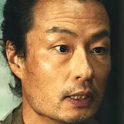 Mutsuo Yoshioka portraying Kahee Mori