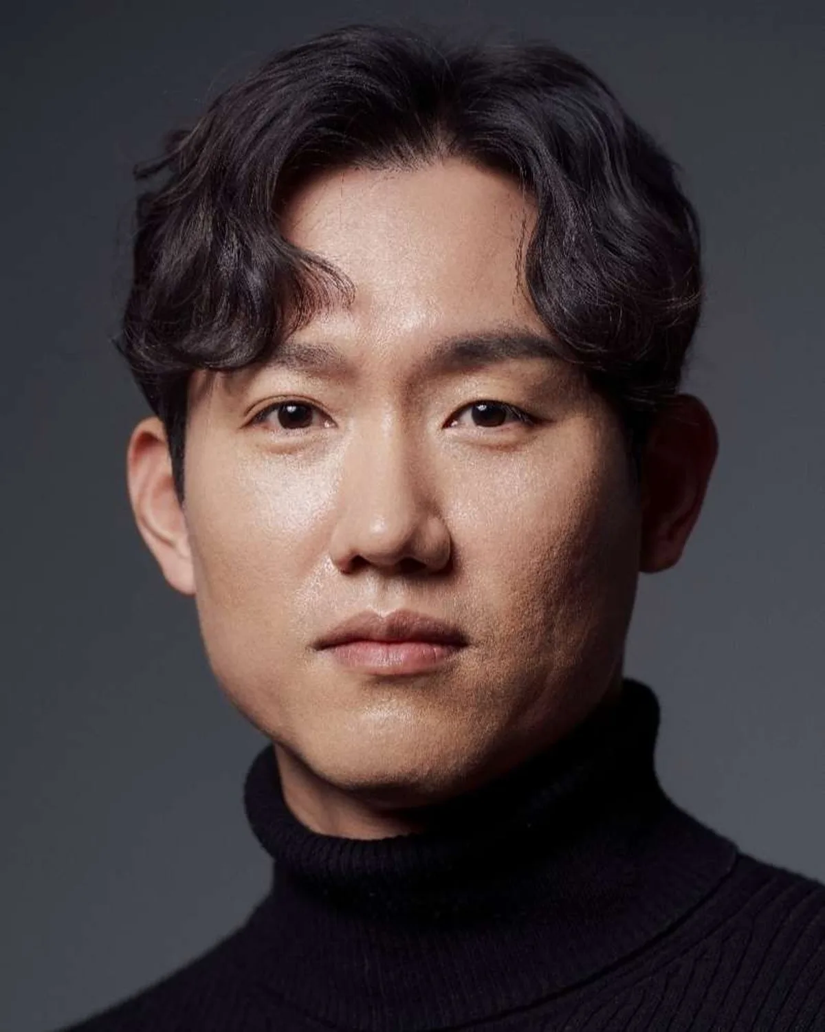 Portrait photograph of actor Byun Joon-Ho