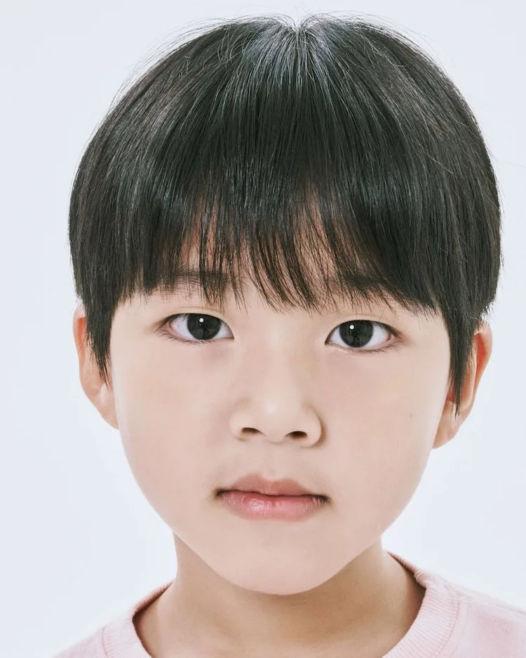 Portrait photograph of child actor Kim Jin-Mok