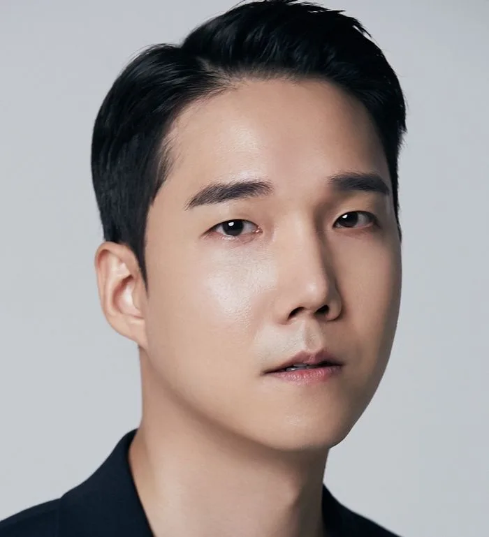 Shin Gun-Woo profile photograph
